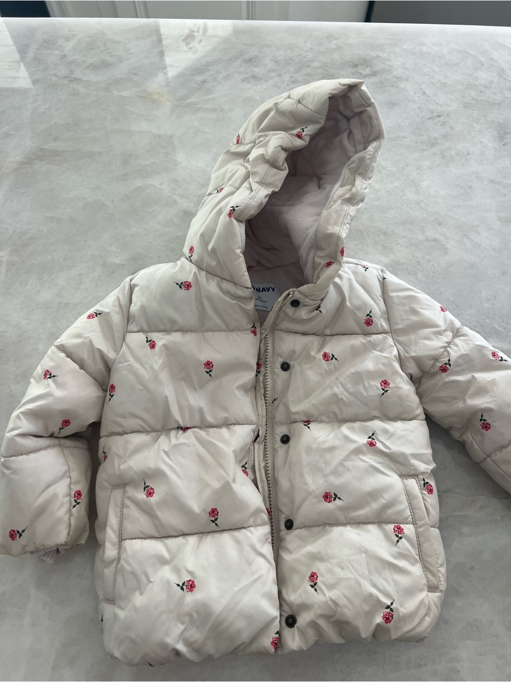 Old Navy cream puffer coat with pink
flower details, 3t